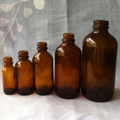 Boston Round Glass bottles with Plastic Cap